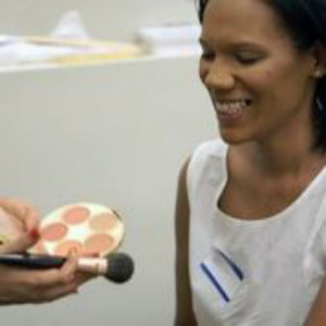 A participant eagerly awaits her makeover.